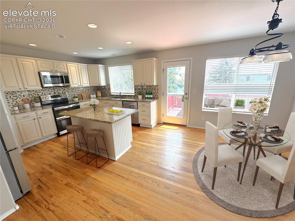 Image 9 of 43: Kitchen - virtually staged