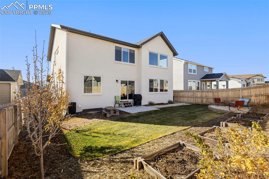 Image 8 of 40: Completely Fenced in Back Yard with 2 Gates.