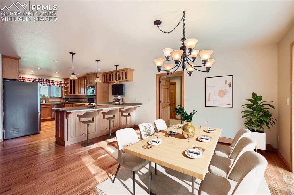 Image 12 of 50: Virtually staged dining room