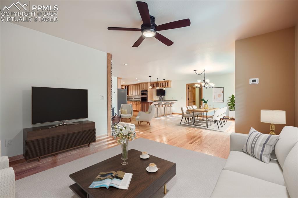 Image 22 of 50: Virtually staged family room