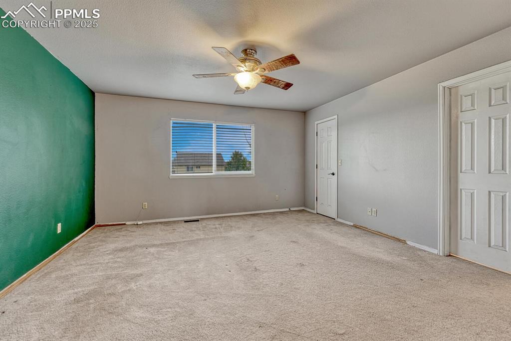 Image 14 of 47: Primary bedroom with walk-in closet and attached 5 piece bathroom
