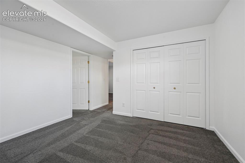 Image 29 of 36: Bonus room in basement!