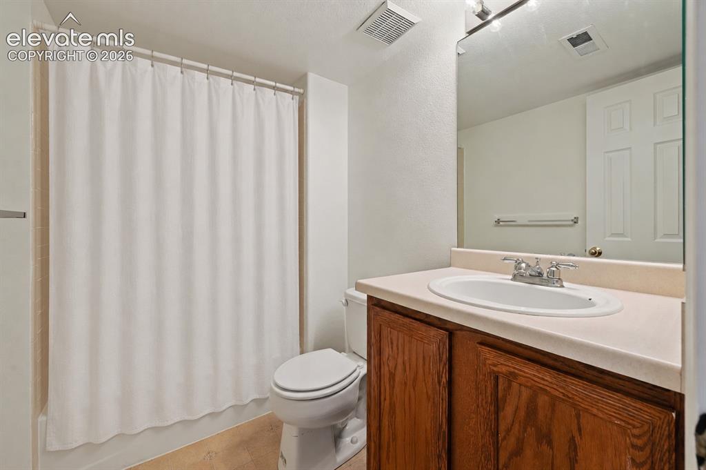 Image 30 of 36: basement bathroom