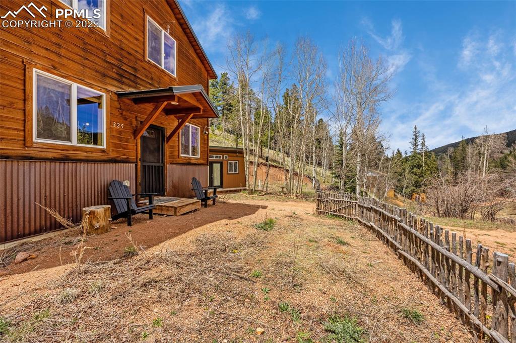 Image 4 of 45: View of yard with fence