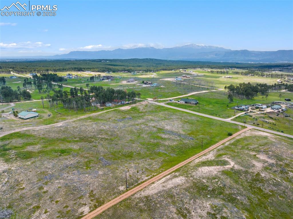 Image 3 of 22: Lot runs along Herring and located on a paved road