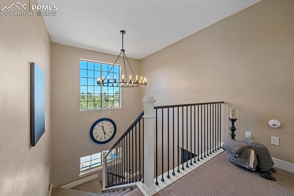 Image 23 of 50: Landing for the stairwell on upper level