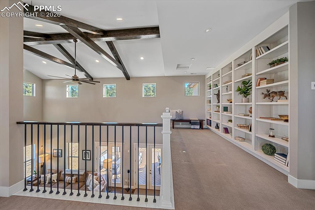 Image 24 of 50: View from the landing to the loft and great room beams 