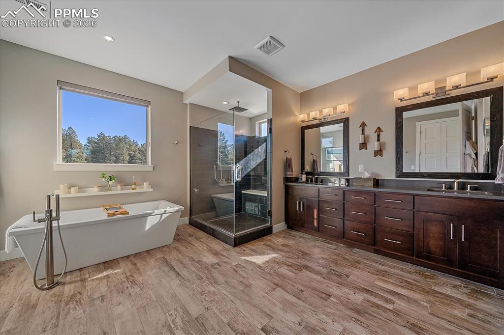 Image 28 of 50: Five Piece Spa Bathroom with oversized shower, and free standing tub and tu