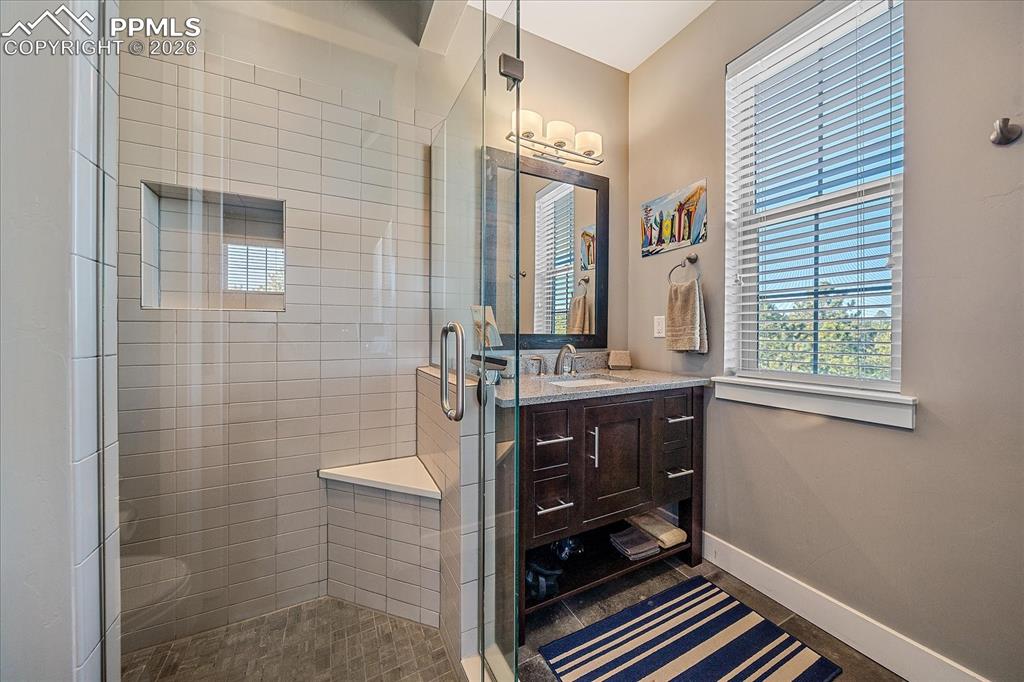 Image 32 of 50: 3/4 ensuite bath for secondary guest bedroom 