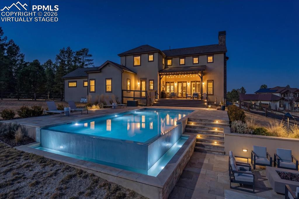 Image 43 of 50: Virtually Staged Pool and Landscaping