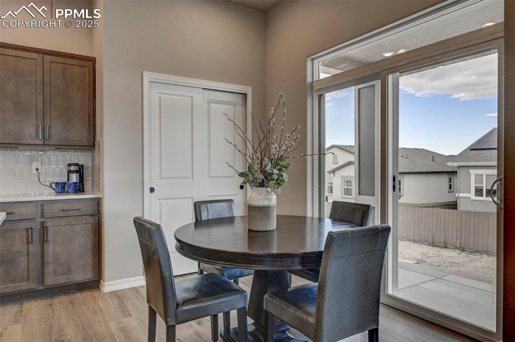 Image 13 of 32: Dining Nook with slider to back patio