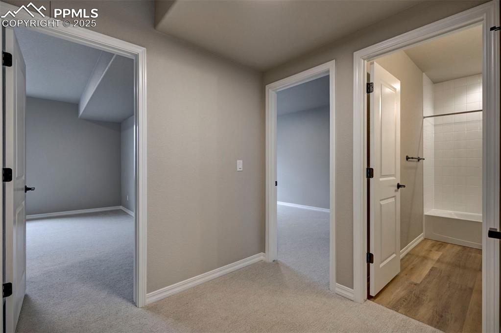 Image 30 of 32: basement bedrooms and bath 