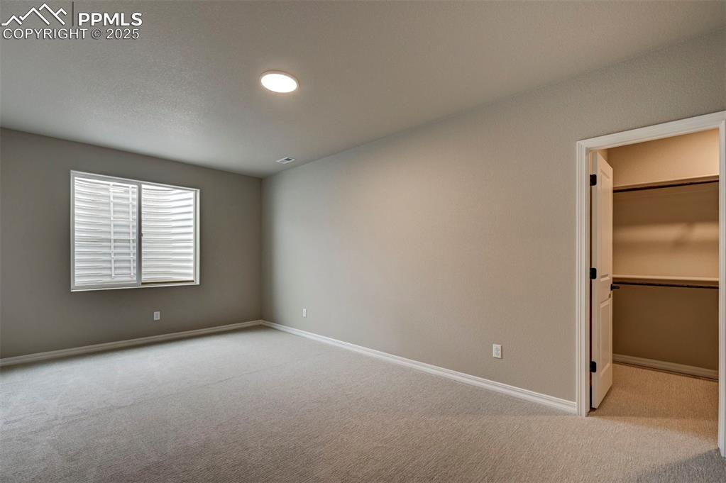 Image 32 of 32: basement bedroom