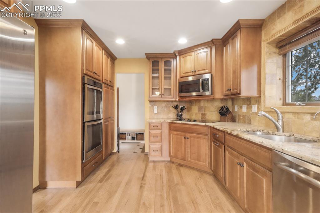 Image 10 of 50: Granite counters, updated stainless steel appliances, double oven, large ea
