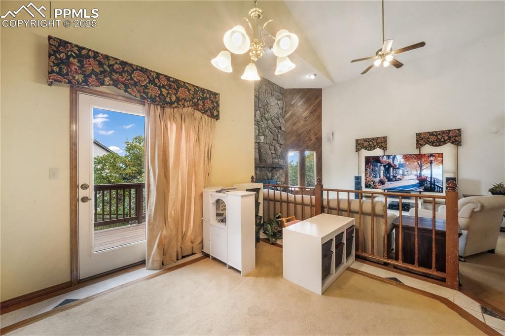 Image 15 of 50: Formal dining room with side deck access