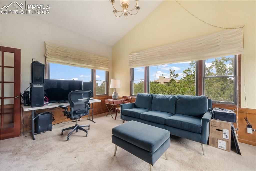 Image 35 of 50: Upper level office/flex room with mountain views and access to full bathroo