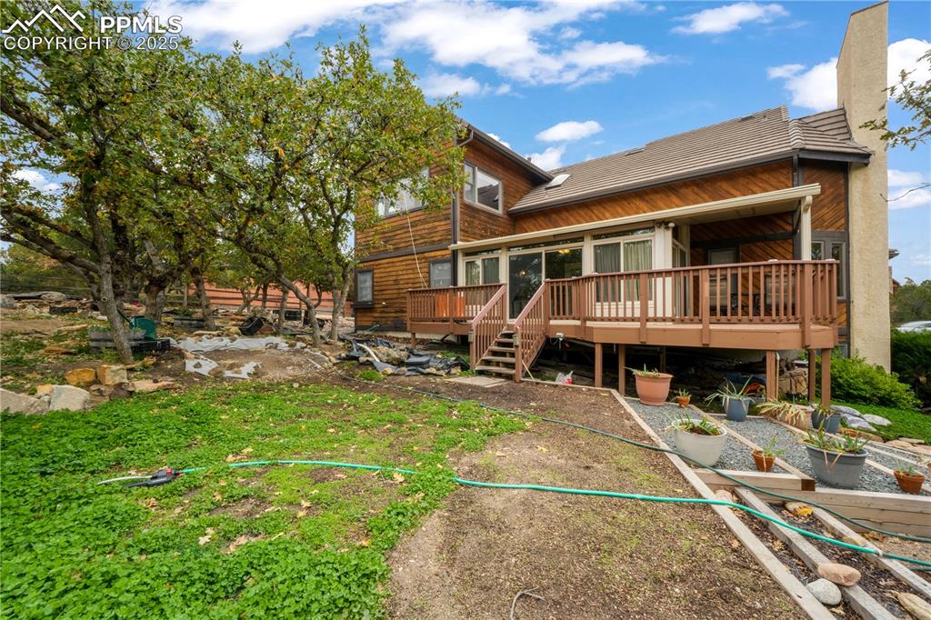Image 44 of 50: Backyard and view of deck