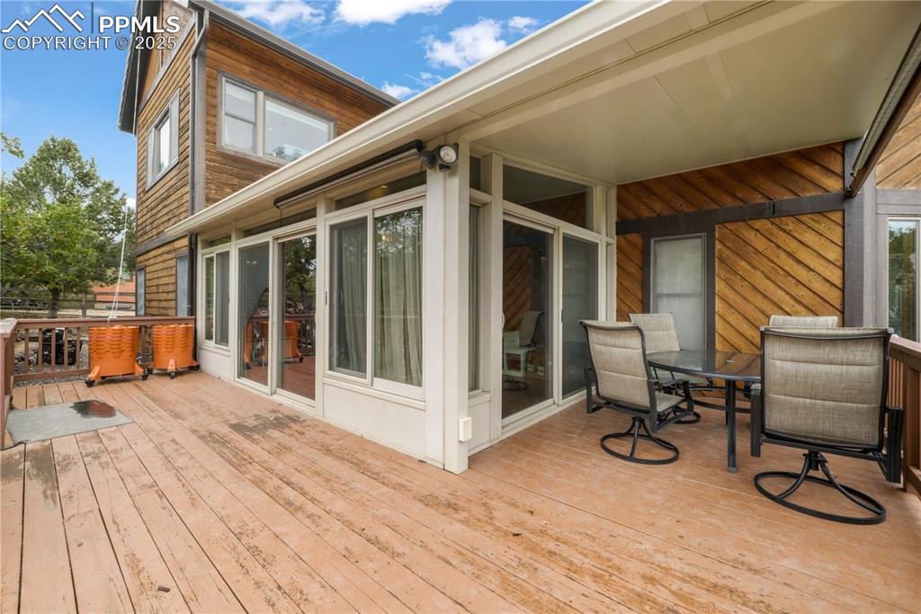 Image 46 of 50: Back deck off of sunroom