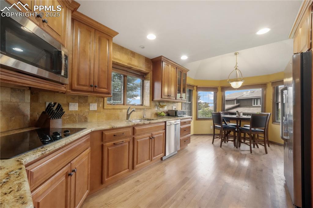 Image 7 of 50: Granite counters, updated stainless steel appliances, double oven, large ea