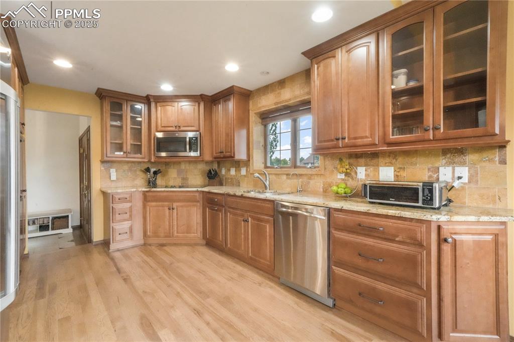 Image 9 of 50: Granite counters, updated stainless steel appliances, double oven, large ea