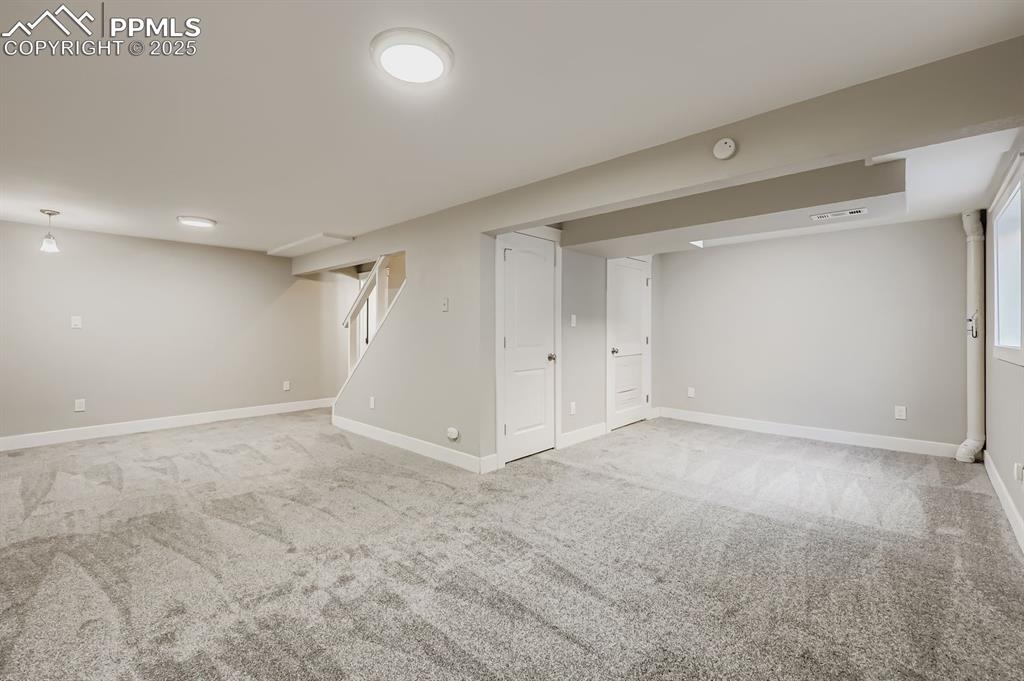 Image 21 of 28: Fantastic flexible recreation space... new carpet!