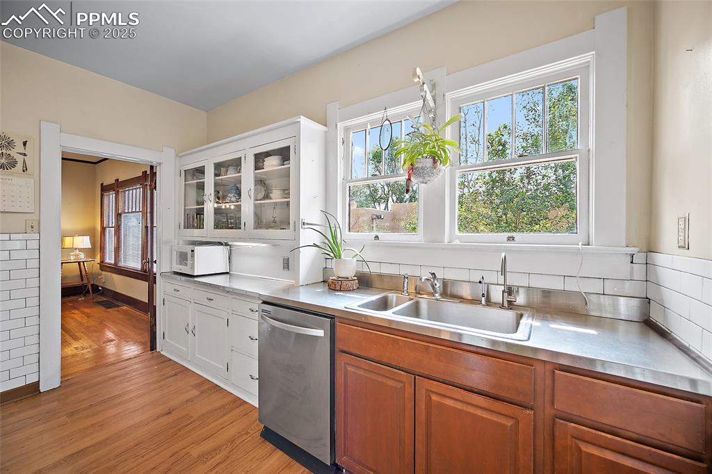Image 15 of 39: Orginal hoosier cabinet, SS counter tops. 