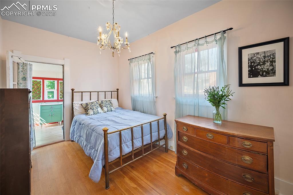 Image 23 of 39: main level bedroom 