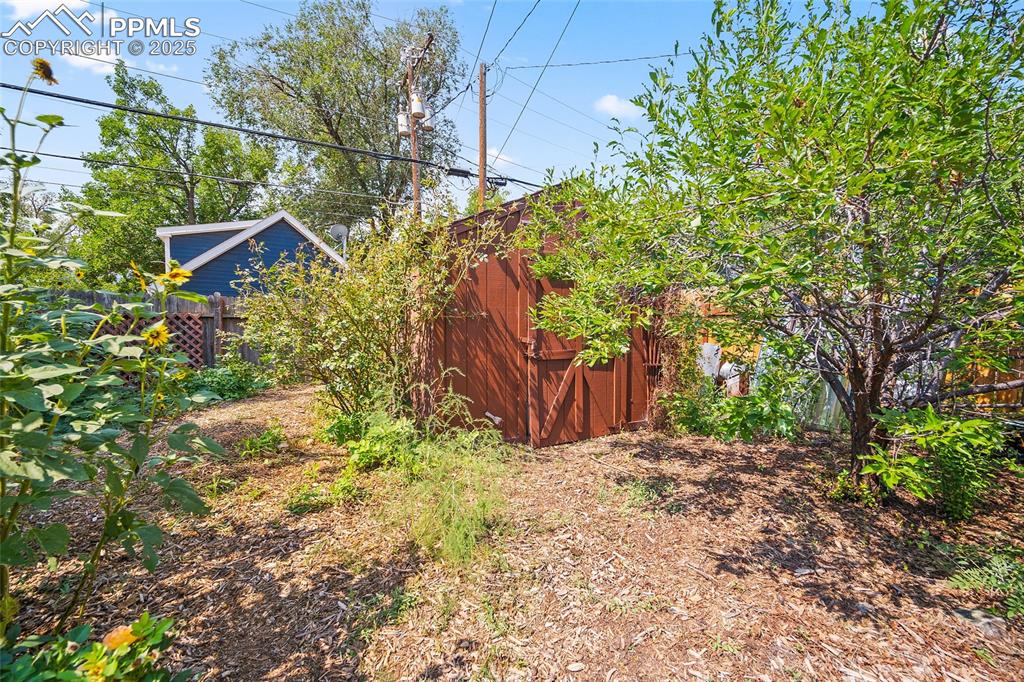 Image 35 of 39: Storage shed
