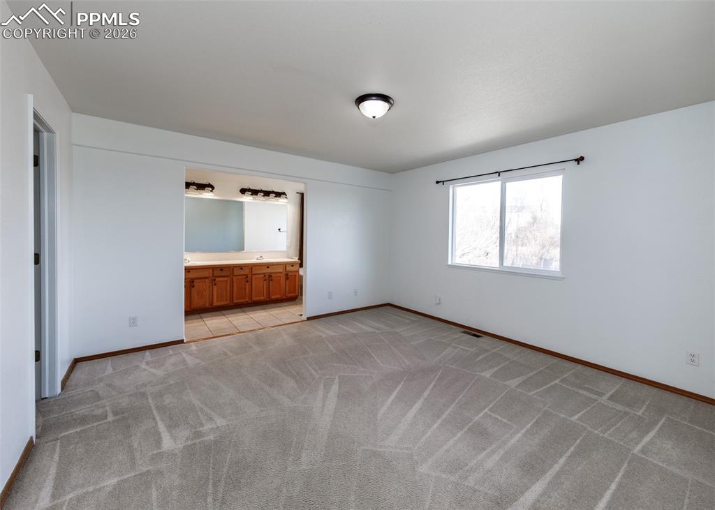 Image 17 of 39: Master Bedroom