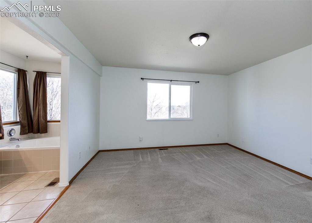 Image 18 of 39: Master Bedroom