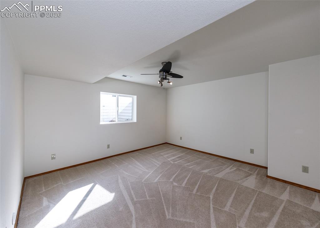 Image 30 of 39: Bedroom Downstairs