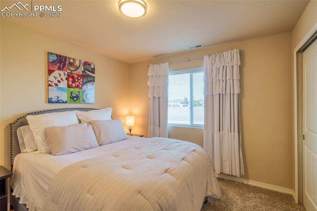 Image 14 of 25: Bedroom