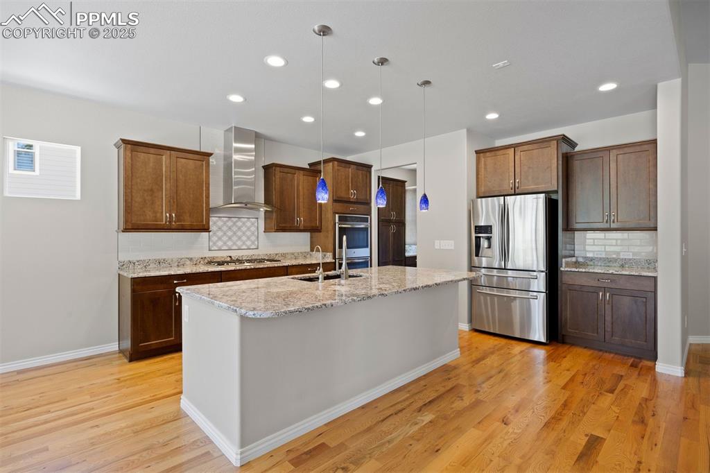 Image 12 of 50: Full pantry, wood, SS appliances