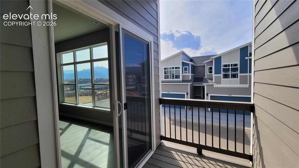 Image 10 of 28: Composite Deck off the Living Room!