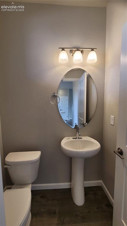 Image 16 of 28: Powder Room, located on main level!