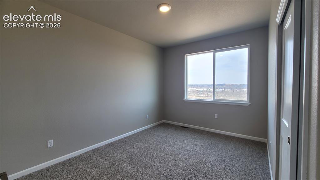 Image 22 of 28: 2nd Bedroom located on upper level!