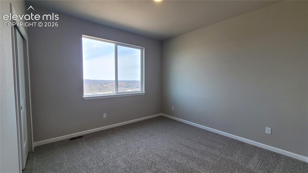 Image 24 of 28: 3rd Bedroom located on upper level!