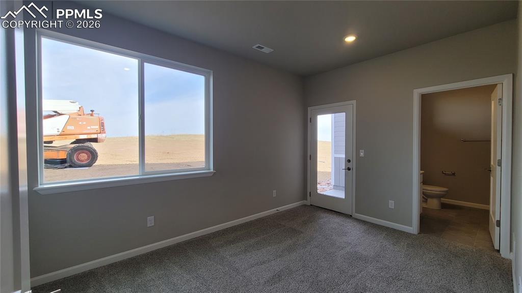 Image 4 of 25: Welcome Home! Inviting Entryway with LVP flooring and garage access! 