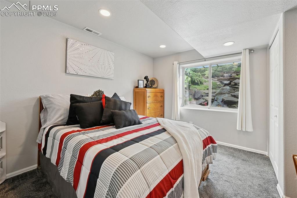 Image 26 of 47: Bedroom in the basement 