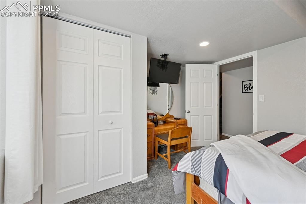 Image 27 of 47: Bedroom in the basement 