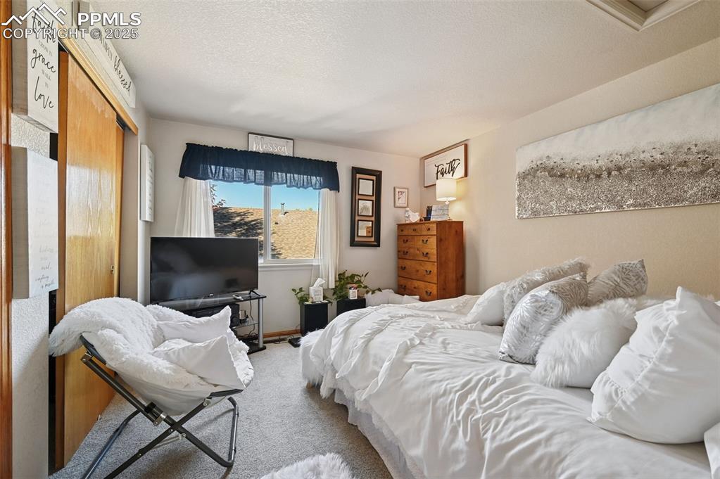 Image 29 of 47: Upstairs bedroom 