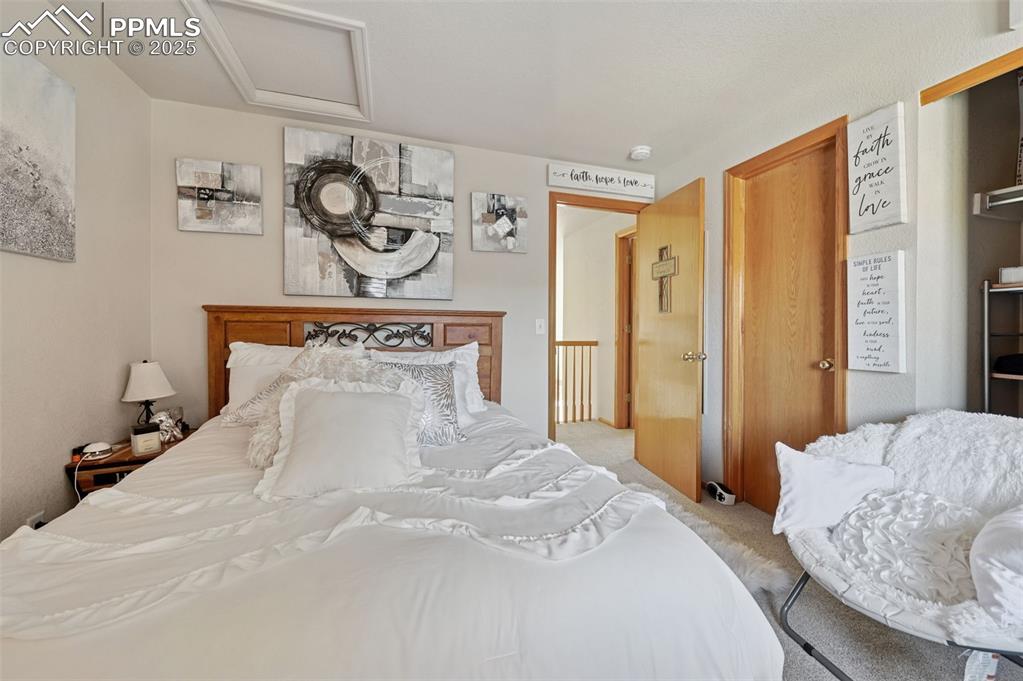 Image 30 of 47: Upstairs bedroom