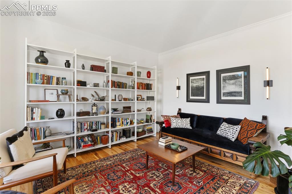 Image 11 of 49: Make this great sitting room your den or library - shelving stays!