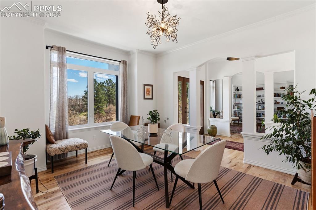 Image 12 of 49: Semi-formal dining room just off the foyer