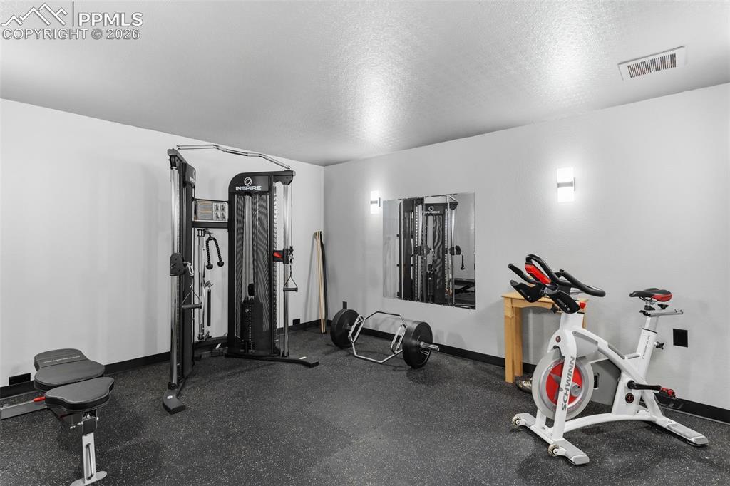 Image 36 of 49: Personal gym/workout space - equipment is negotiable!
