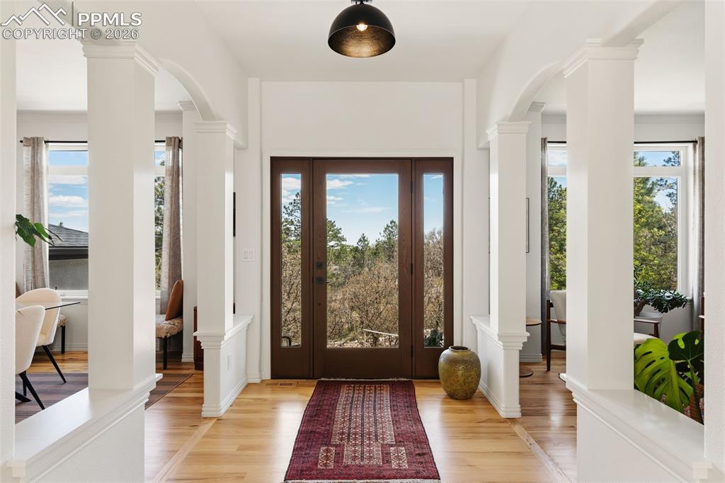 Image 5 of 49: Welcoming foyer to this beautifully remodeled home!