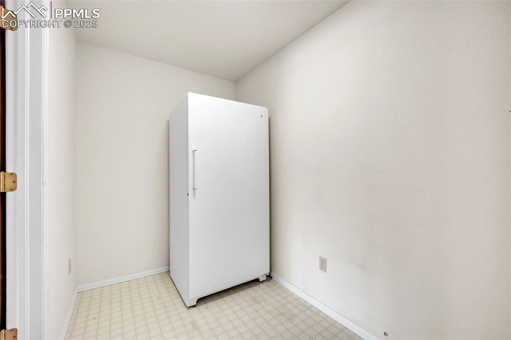 Image 10 of 34: Pantry/Closet adjacent to the Kitchen & Family Room