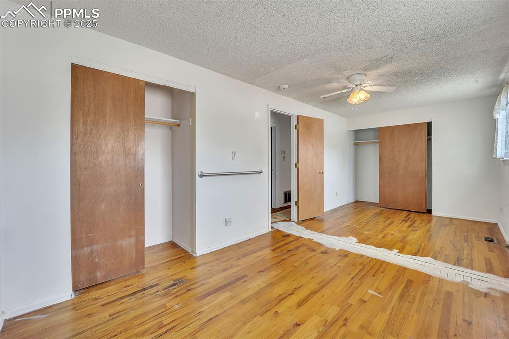 Image 16 of 34: Two smaller bedrooms were converted into one large Primary bedroom!