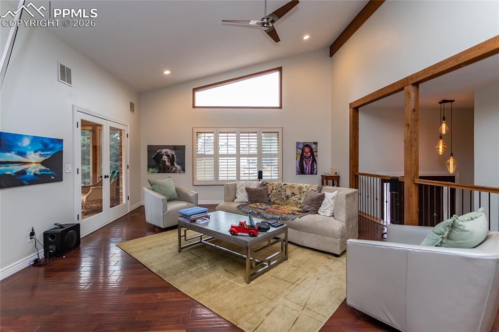 Image 10 of 45: Open concept, beautiful floors, cozy fireplace - an entertainers dream layo