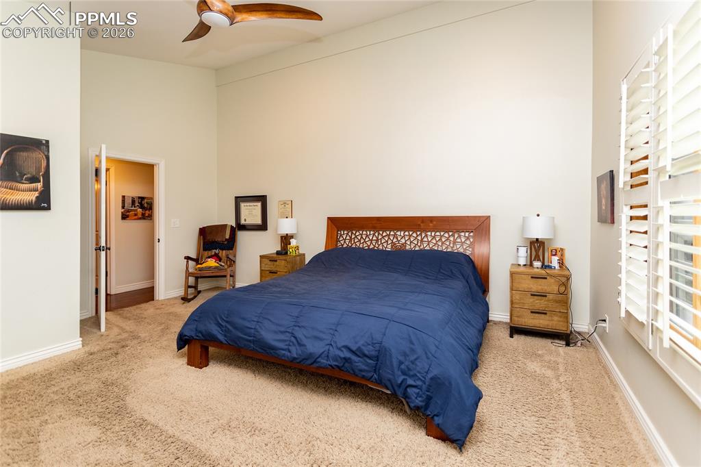 Image 24 of 45: Your large, comfortable primary suite can accomadate a king size bed, night